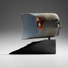 Janus by Bertil Vallien, c. 1985, sand-casted glass, granite, sold Sep 2024