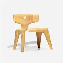 child's chair by Charles and Ray Eames, 1944, molded birch plywood, sold Feb 2020