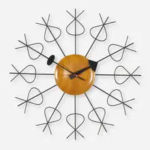 Knot clock, model 4775 by George Nelson & Associates, 1952, maple, enameled metal and brass, sold Feb 2020