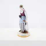 Meissen, Gänsemagd, Porzellan, polychrom staffiert, Goldrand.