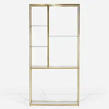 shelving unit by Milo Baughman, c. 1975, brass-plated steel, glass, sold Feb 2020