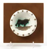 Bull by Pablo Picasso, 1952, Turned round ashtray of white earthenware clay, oxidized paraffin decoration, white enamel, sold Feb 2021