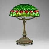 Pomegranate table lamp by Tiffany Studios, c. 1906, leaded glass, patinated bronze, sold Jul 2024