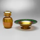 Intaglio cologne bottle and footed bowl by Tiffany Studios, c. 1910, hand-blown and wheel-carved Favrile glass, sold Jul 2024