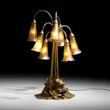 Tiffany Studios, Seven-light Lily table lamp base, c. 1910, acid-etched and gilt bronze, hand-blown glass