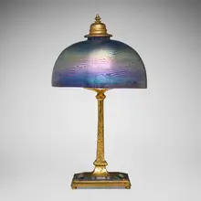 Inc. Louis C. Tiffany Furnaces, Rare Damascene table lamp, c. 1920, gilt, enameled and acid-etched bronze, hand-blown Favrile glass