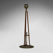 Tripod candlestick with snuffer by Tiffany Studios, c. 1910, patinated bronze, sold Jul 2024