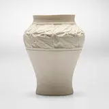 Favrile Pottery vase with leaves by Tiffany Studios, 1904-14, bisque earthenware, sold Jul 2024