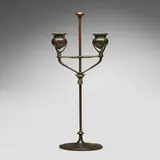 Adjustable two-light candlestick by Tiffany Studios, c. 1910, patinated bronze, sold Jul 2024