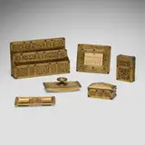 Tiffany Studios, Ninth Century six-piece desk set, c. 1915, acid-etched and gilt bronze, glass, printed card stock