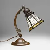 Handel, Teroca geometric overlay desk lamp, c. 1910, patinated metal, slag glass