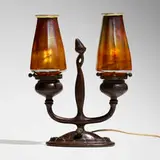 Candle lamp with reactive shades by Tiffany Studios, c. 1910, patinated bronze, hand-blown Favrile glass, sold Jul 2024
