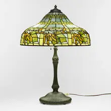 attribution Wilkinson Co., Maple leaf border table lamp, c. 1910, leaded glass, patinated metal