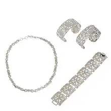 Stavre Gregor Panis, jewelry articles with repoussé and cutout floral decoration