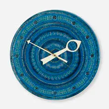 Rimini Blu Meridian clock, model no. 7552 by Aldo Londi, c. 1965, glazed stoneware, enameled aluminum, brass, sold Jan 2020
