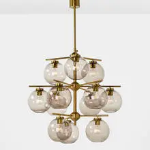 Holger Johansson, chandelier and two sconces, 1952, matte and polished brass, blown glass