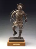 Tom Knapp, Navajo Hoop Dancer, patinated bronze on a wooden base