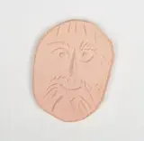 Face by Pablo Picasso, 1954, Oval medallion of red earthenware clay, sold Oct 2020