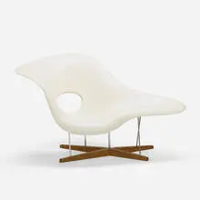 La Chaise by Charles and Ray Eames, lacquered fiberglass, oak, chrome-plated steel, sold Oct 2019