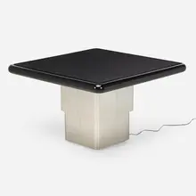 Rare adjustable dining/coffee table by Paul Evans, c. 1980, polished stainless steel, lacquered wood, laminate, sold Jun 2024