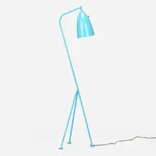 Grasshopper floor lamp by Greta Magnusson Grossman, 1947, enameled steel and aluminum, brass, sold Jun 2024