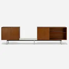 bench with cabinets by George Nelson & Associates, c. 1948, walnut, matte chrome-plated steel, enameled steel, laminate, aluminum, sold Sep 2019