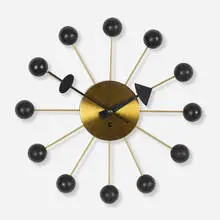 Ball wall clock, model 4755 by George Nelson & Associates, 1949, brass, lacquered wood, enameled aluminum, sold Sep 2019