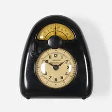 Isamu Noguchi, Measured Time clock and kitchen timer, c. 1932, Bakelite, glass, printed paper, enameled brass