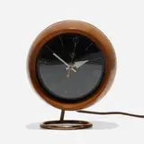 table clock, model 4765A by George Nelson & Associates, 1949, walnut, glass, brass-plated steel, enameled aluminum, brass, sold Sep 2019