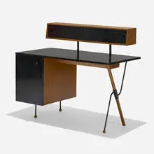 desk by Greta Magnusson Grossman, c. 1952, laminate, walnut, lacquered masonite, enameled steel, sold Sep 2019