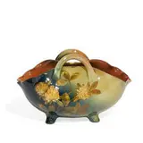 two-handled Standard Glaze basket with white clover decoration by Emma D. Foertmeyer for Rookwood Pottery, sold Nov 2021