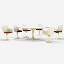 dining set by Eero Saarinen, 1956, enameled steel, laminate over lacquered wood, enameled aluminum, molded fiberglass, upholstery, sold Sep 2019