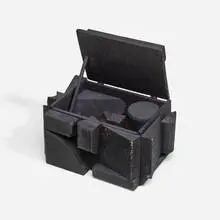 Black Cryptic XLII by Louise Nevelson, 1979, wood painted black, sold May 2024
