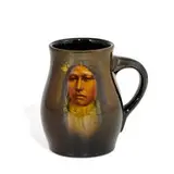 earthenware Standard Glaze mug with a portrait of the Native American male by Sadie Markland for Rookwood Pottery & Gorham, sold Nov 2021