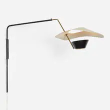 Cerf Volant adjustable wall light by Pierre Guariche, c. 1953, enameled and perforated steel, brass, sold Jun 2019