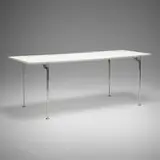 Alexander Girard, table for Braniff Airlines, 1965, cast aluminum, Corian
