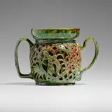 Rare reticulated vase by George E. Ohr, 1899, glazed earthenware, sold Apr 2024