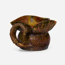 Snake pitcher by George E. Ohr, 1987-1900, glazed earthenware, sold Apr 2024
