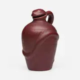 Early snake jug, 1902 by Artus Van Briggle for Van Briggle Pottery, 1902, glazed earthenware, cork, sold Apr 2024
