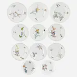 Eleven plates from the Service fleurs et oiseaux jetés by Félix Bracquemond for Haviland & Co., 1875-76, glazed, hand-decorated, and transfer-printed porcelain, sold Apr 2024