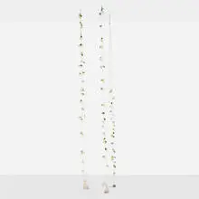 Tony Feher, Untitled (Morning Glories), 1993, yarn, plastic flowers, marbles, ball bearing, glass, canvas bag