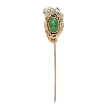 Marshall Field & Co., stick pin with an inset cabochon stone