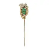 Marshall Field & Co., stick pin with an inset cabochon stone