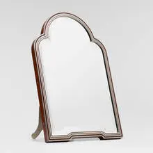 Hermès, table mirror, c. 1975, mirrored glass, chrome-plated and enameled brass, cherry