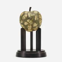 Mona Lisa Apple by Jiří Kolář, 1963, collage on found object, ebony, sold Apr 2019