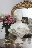 Nilda Boero, Untitled, an Italian carved white marble bust of a lady in a flowing dress, on a waisted socle
