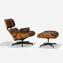 Charles and Ray Eames, 670 armchair and 671 ottoman, rosewood plywood, leather, enameled aluminum, enameled steel, rubber