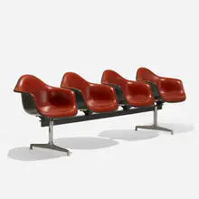 Tandem Shell Seating by Charles and Ray Eames, 1963, molded fiberglass, enameled steel, cast aluminum, vinyl, enameled aluminum, rubber, plastic, sold Feb 2019
