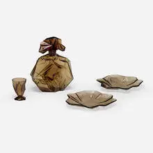Collection of four Ruba Rombic works by Reuben Haley, c. 1931, mold-blown Smoky Topaz glass, sold Mar 2024