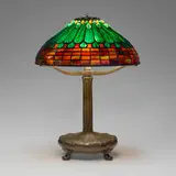 Jeweled Feather table lamp by Tiffany Studios, c. 1910, leaded glass, patinated bronze, sold Mar 2024